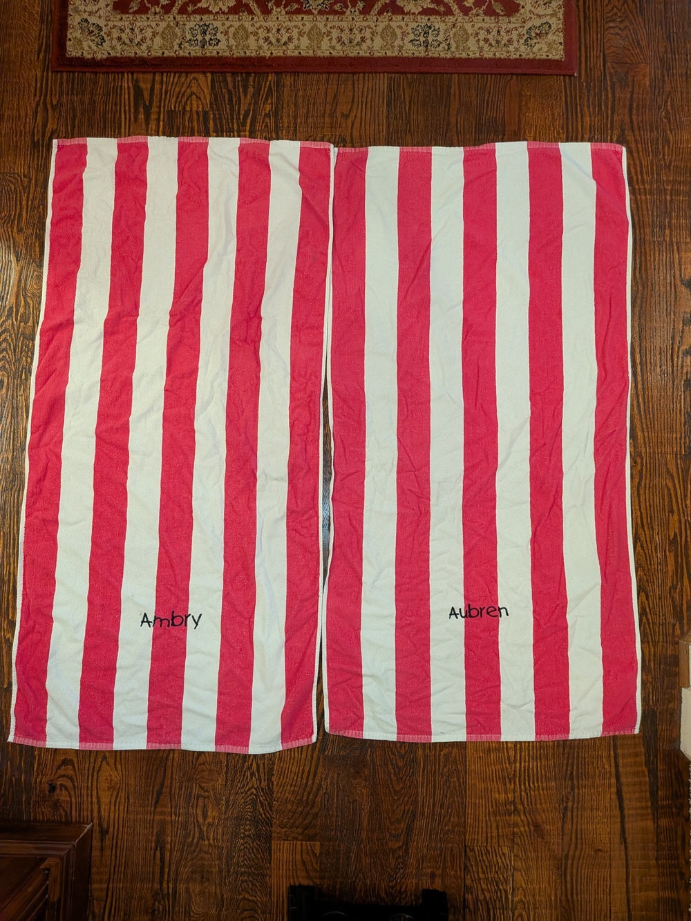 2) Personalized pink and white cabana stripe beach towels